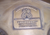 Steinway logo before refinishing.