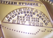 Plate refinished and hand stenciled. 