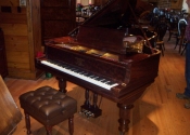 Piano with matching artist bench.